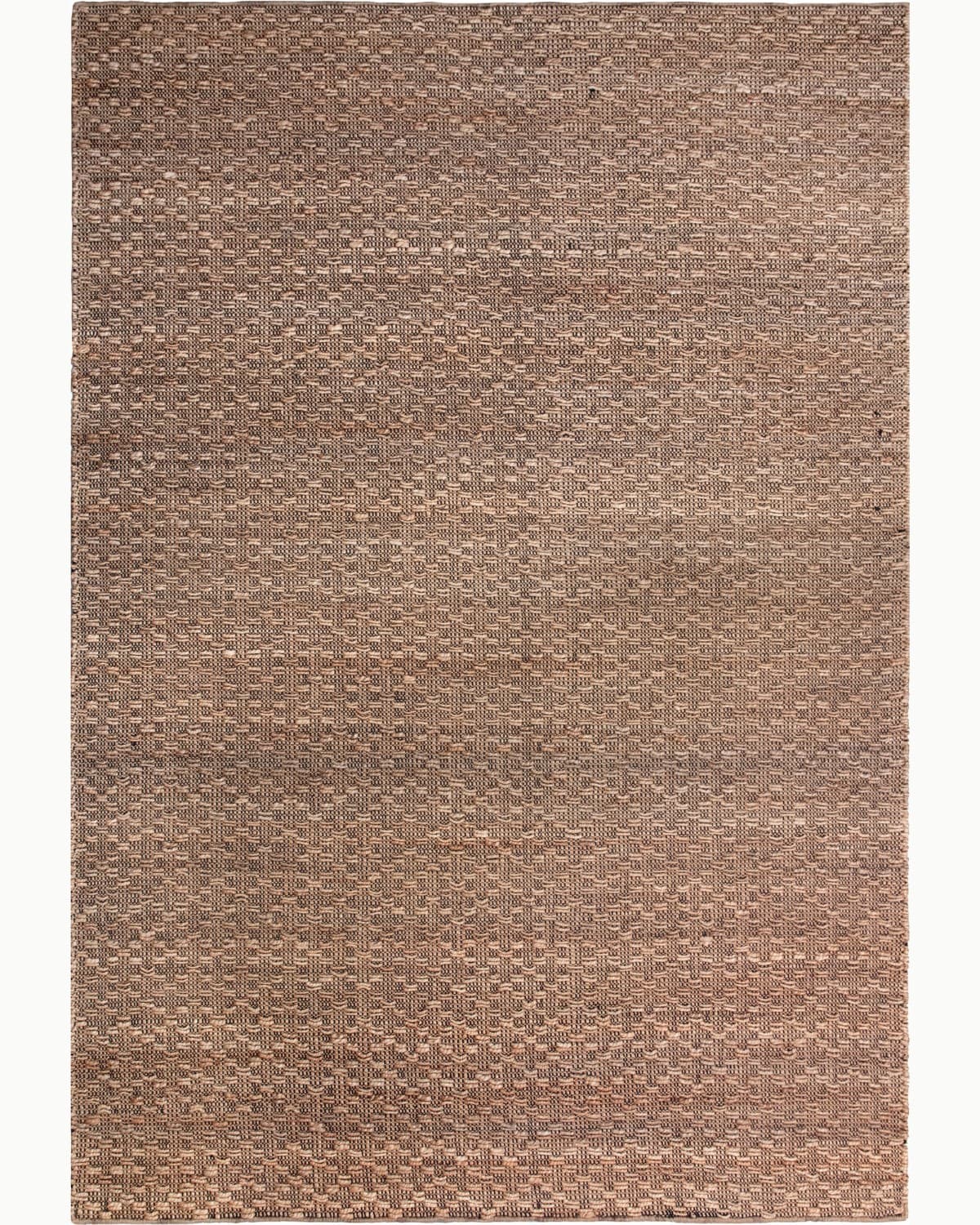 House of Bohi Arota natural jute area rug featuring a handwoven flatweave with contrasting black cotton warp.