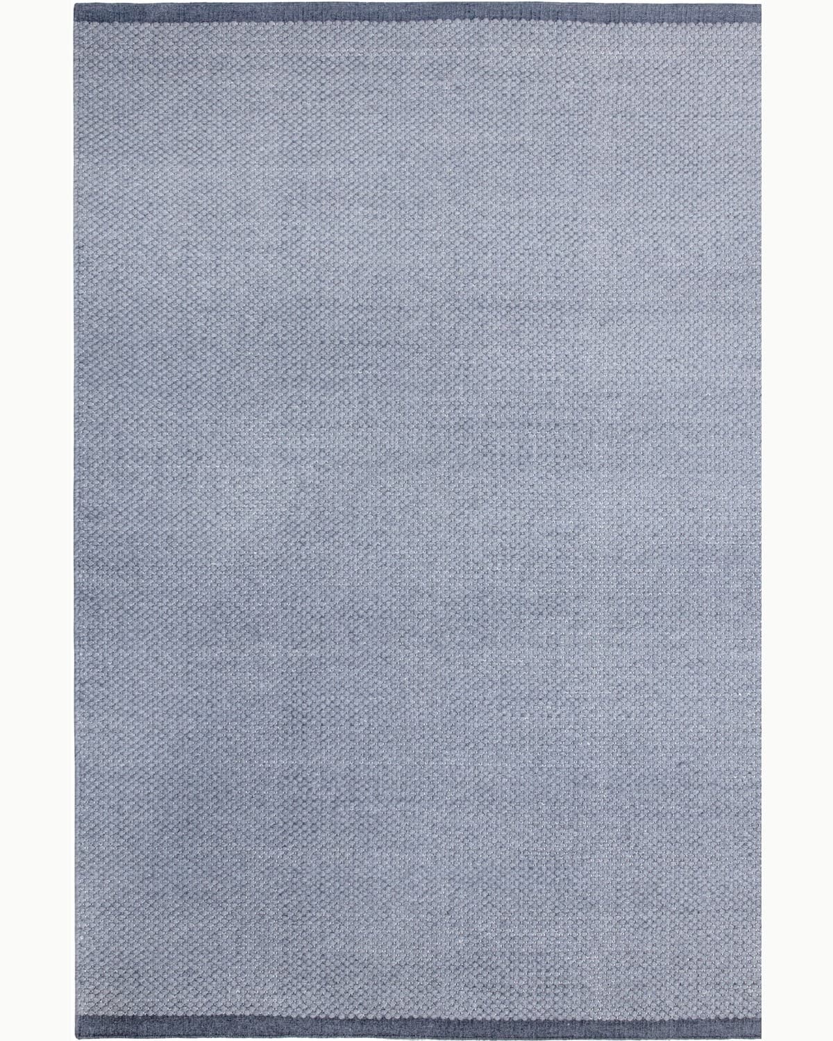 House of Bohi Bindi charcoal wool area rug featuring a handwoven flatweave with a fine, beaded texture.