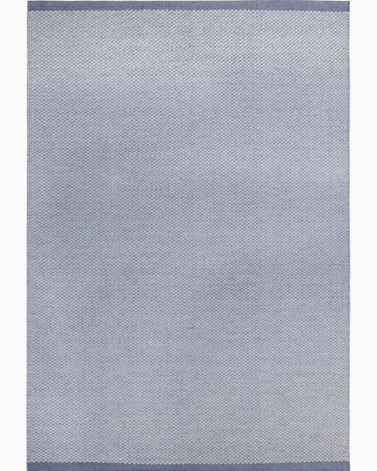 House of Bohi Bindi grey wool area rug featuring a handwoven flatweave with a fine, beaded texture.