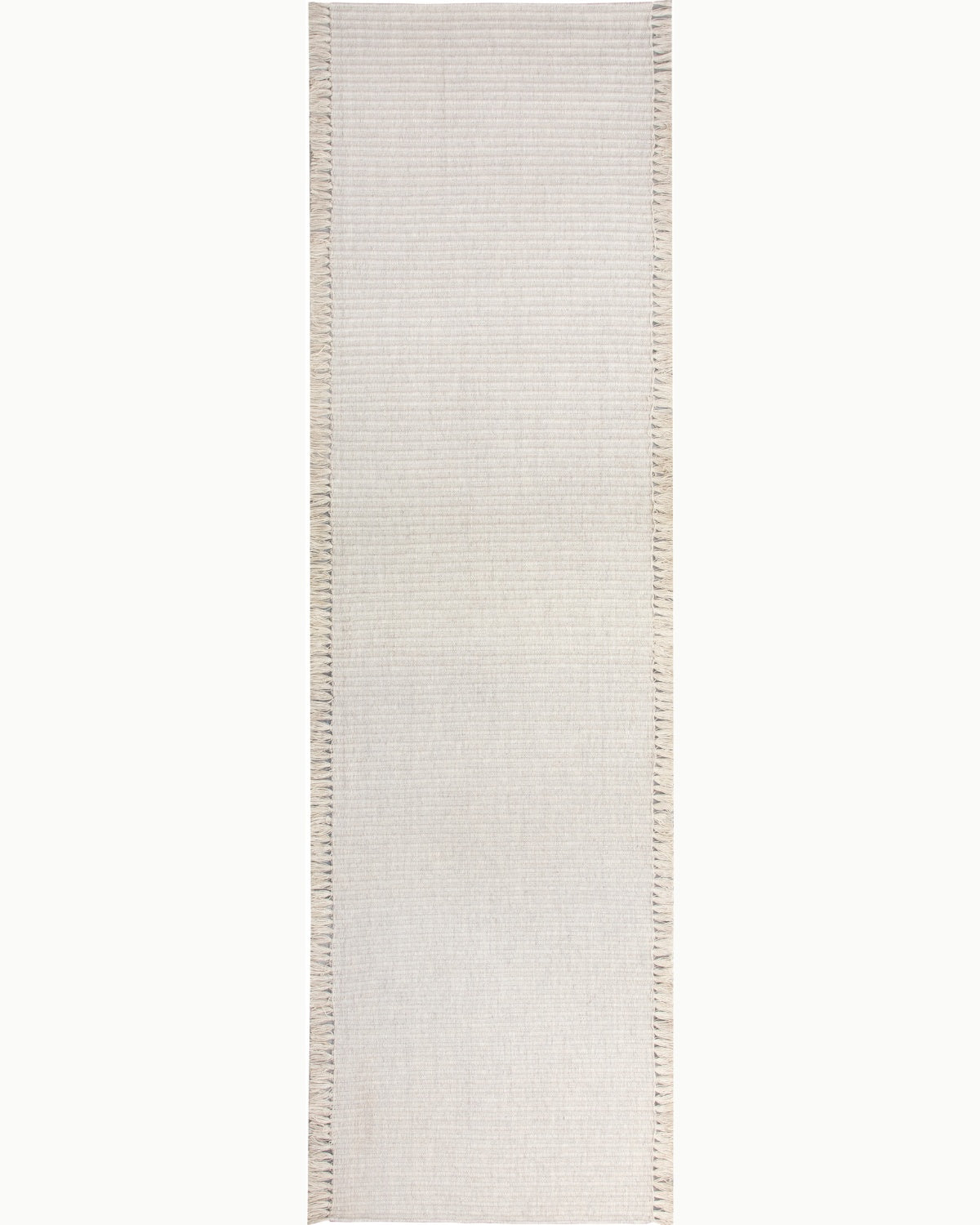 House of Bohi Daabi ivory wool runner featuring a structured handwoven flatweave design with fine vertical ribs.