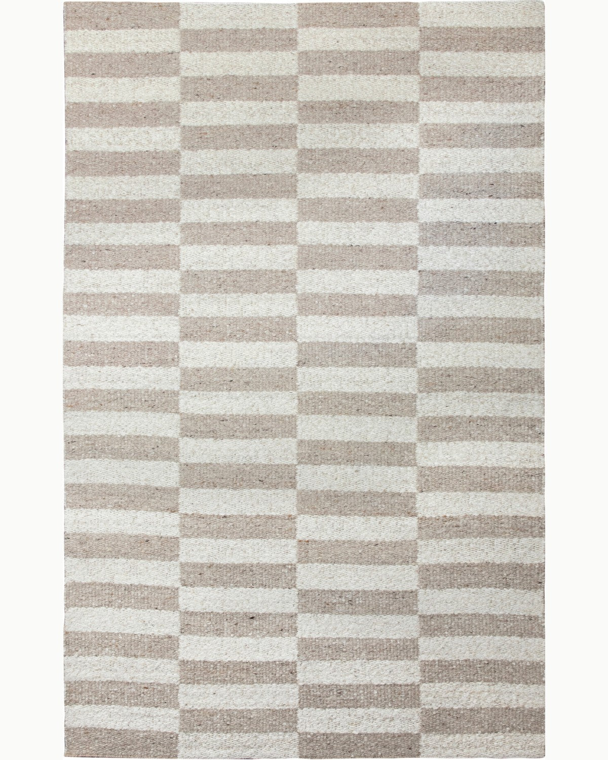 House of Bohi Laani area rug in ivory and brown. A geometric pattern handwoven from natural New Zealand wool.
