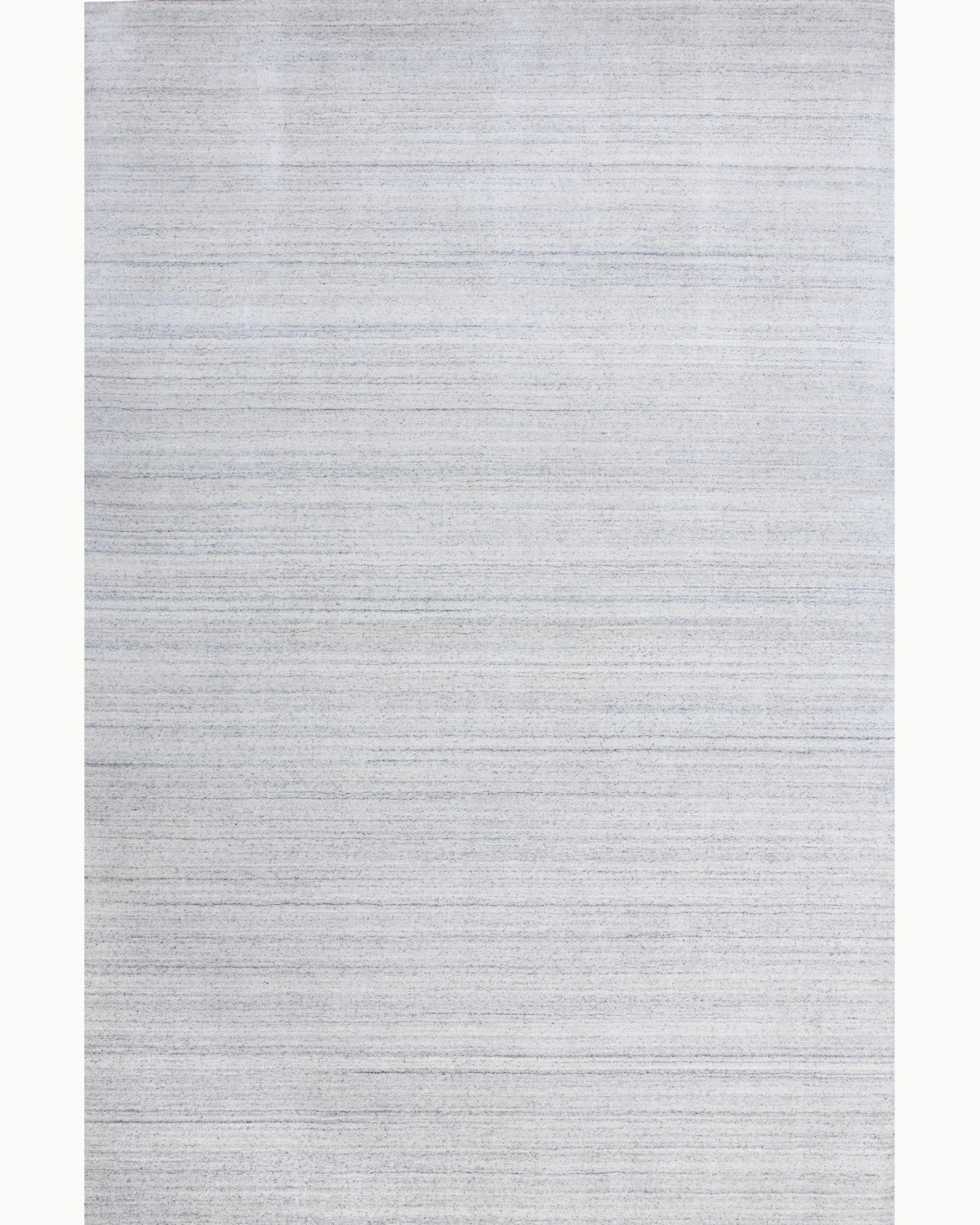 House of Bohi Loma handloomed wool and viscose area rug in steel blue, showing a full overhead view of its organic rhythm.