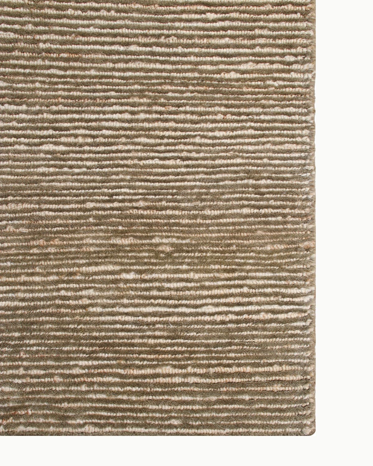 Detailed overhead view of the neat edge binding on this GoodWeave certified, ethically handmade Indian floor piece.