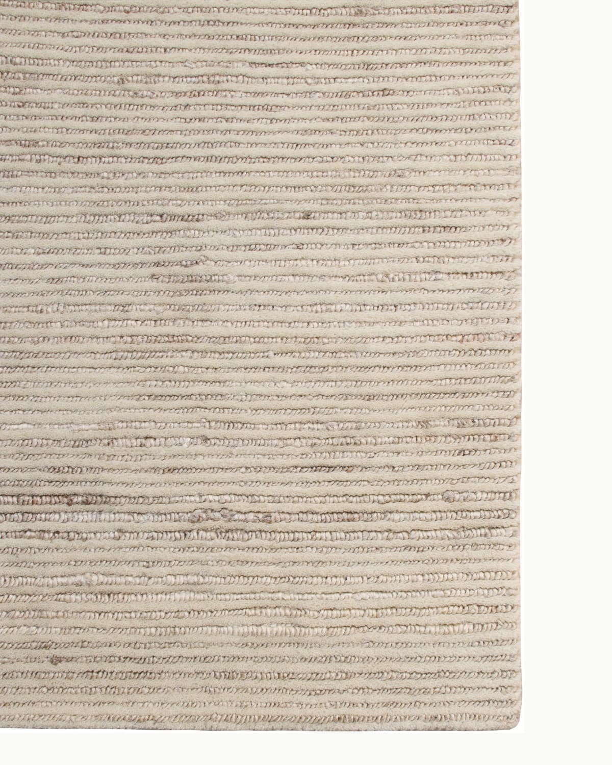 Detail of the edge finishing on this GoodWeave certified natural fiber rug, ethically handmade in Bhadohi, India.