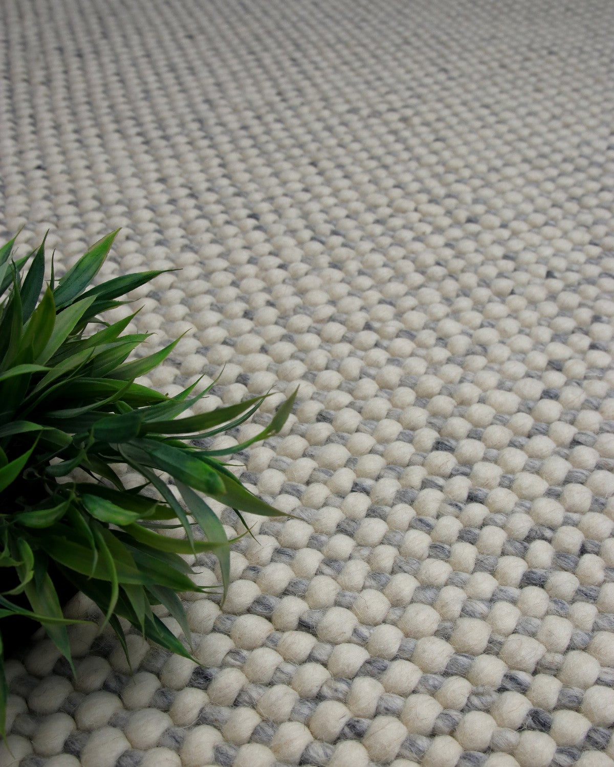 This resilient 20mm pile handwoven flatweave grounds a living room or bedroom with quiet comfort and an earthy texture.