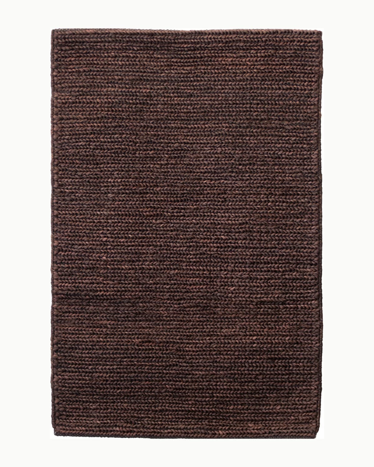 House of Bohi Nari Mat in chocolate, a premium handwoven jute flatweave mat providing an earthy anchor.