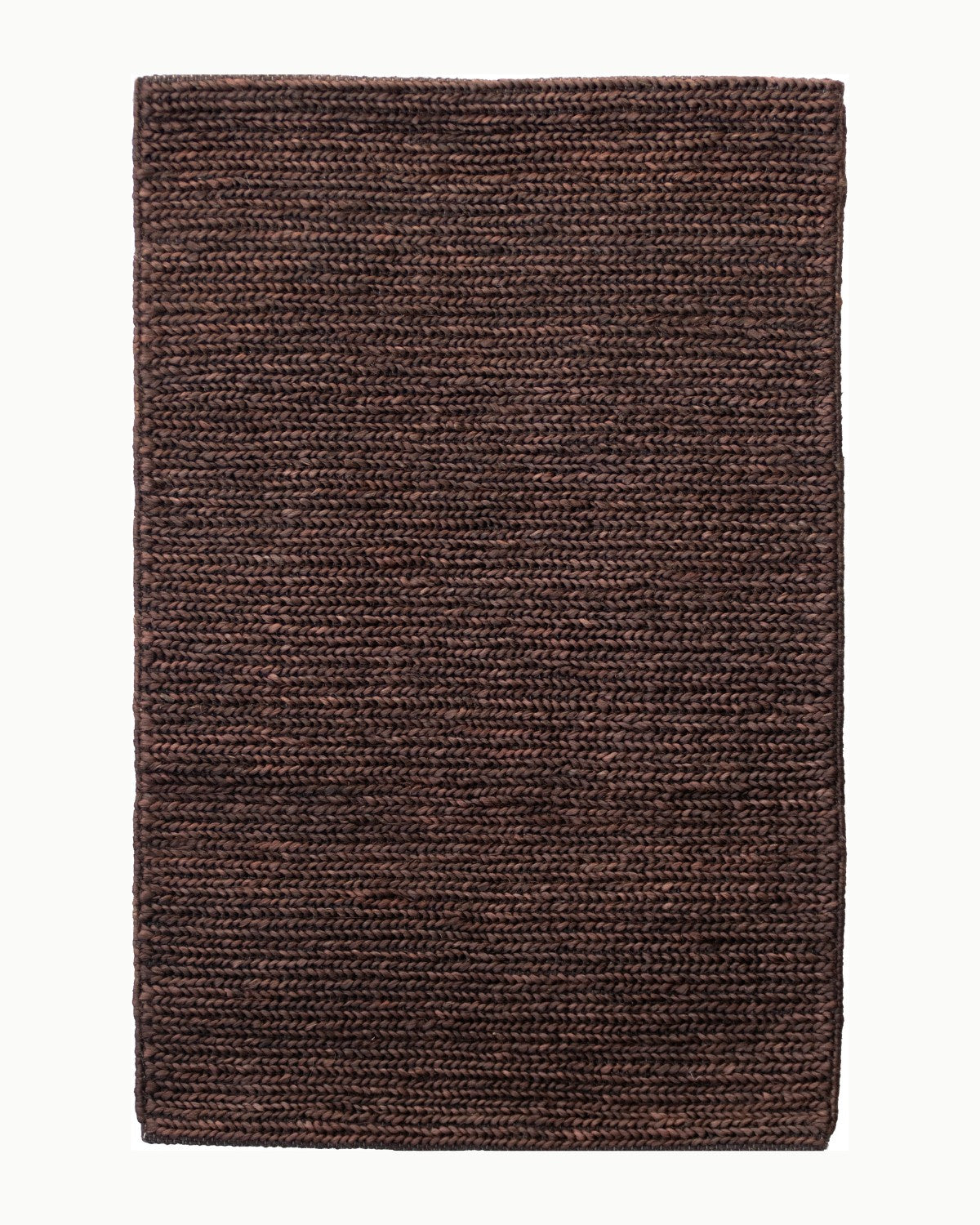 House of Bohi Nari Mat in chocolate, a premium handwoven jute flatweave mat providing an earthy anchor.