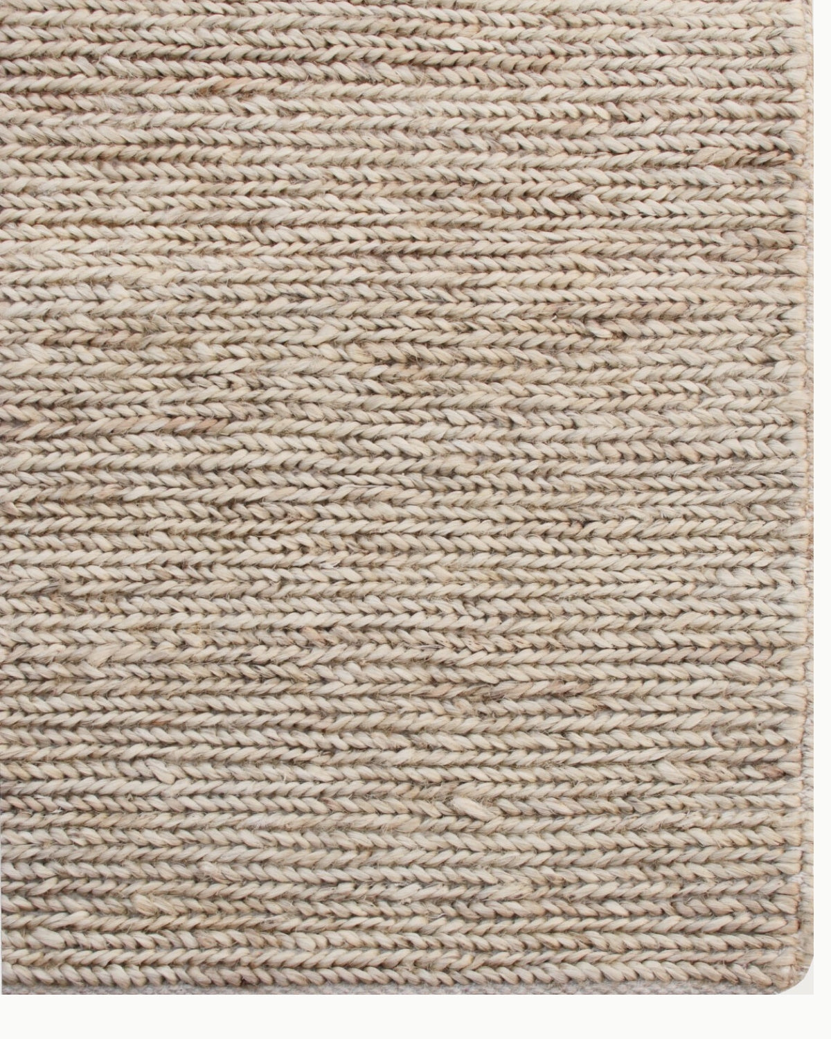 Detailed view of the straight bound edge, showcasing the structural rhythm and timeless appeal of the natural materials.