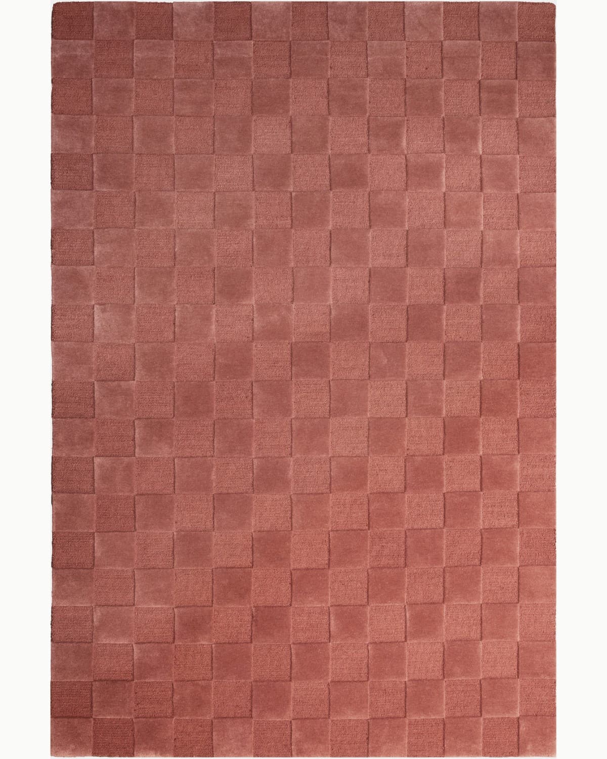 House of Bohi Navo area rug in rosewood, featuring a geometric checkerboard design hand-tufted from premium New Zealand wool.