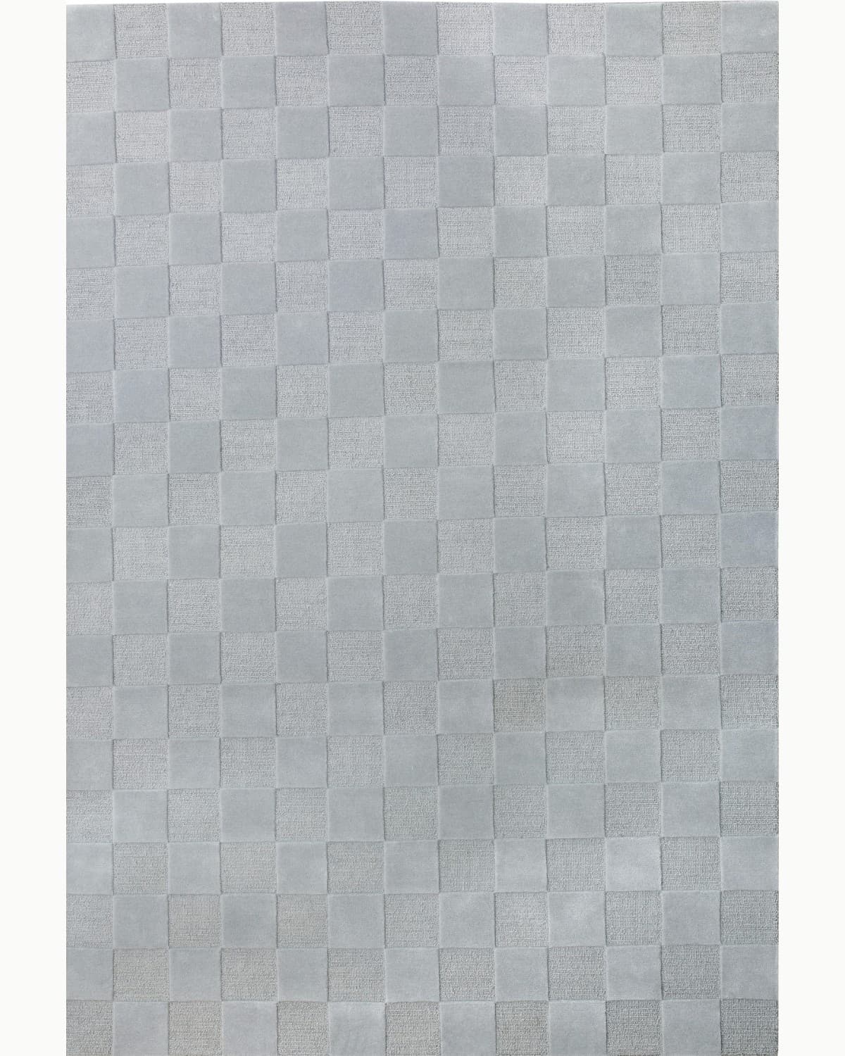 House of Bohi Navo area rug in silver mist, a geometric checkerboard design hand-tufted from premium New Zealand wool.