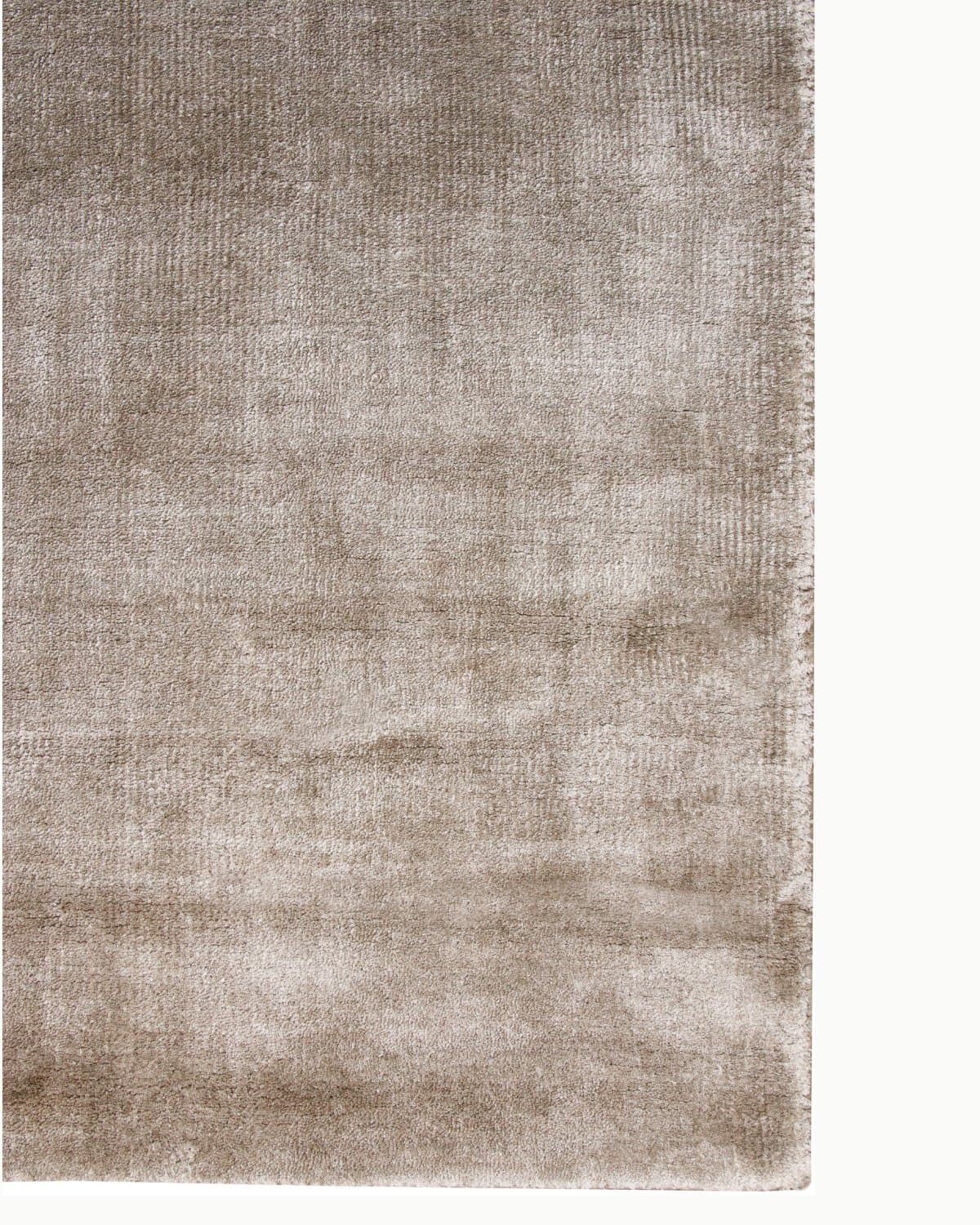 Flat view of the handloomed finish, capturing the subtle surface texture and radiant presence of this design.