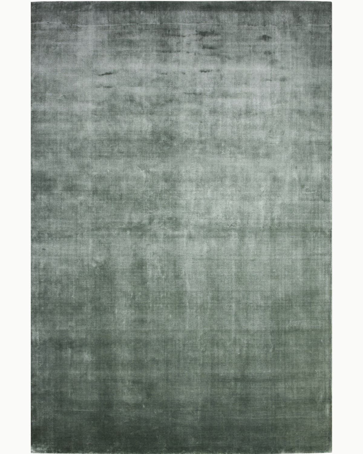 House of Bohi Noor sage area rug handloomed in silky Tencel, offering a luminous calm and understated opulence.