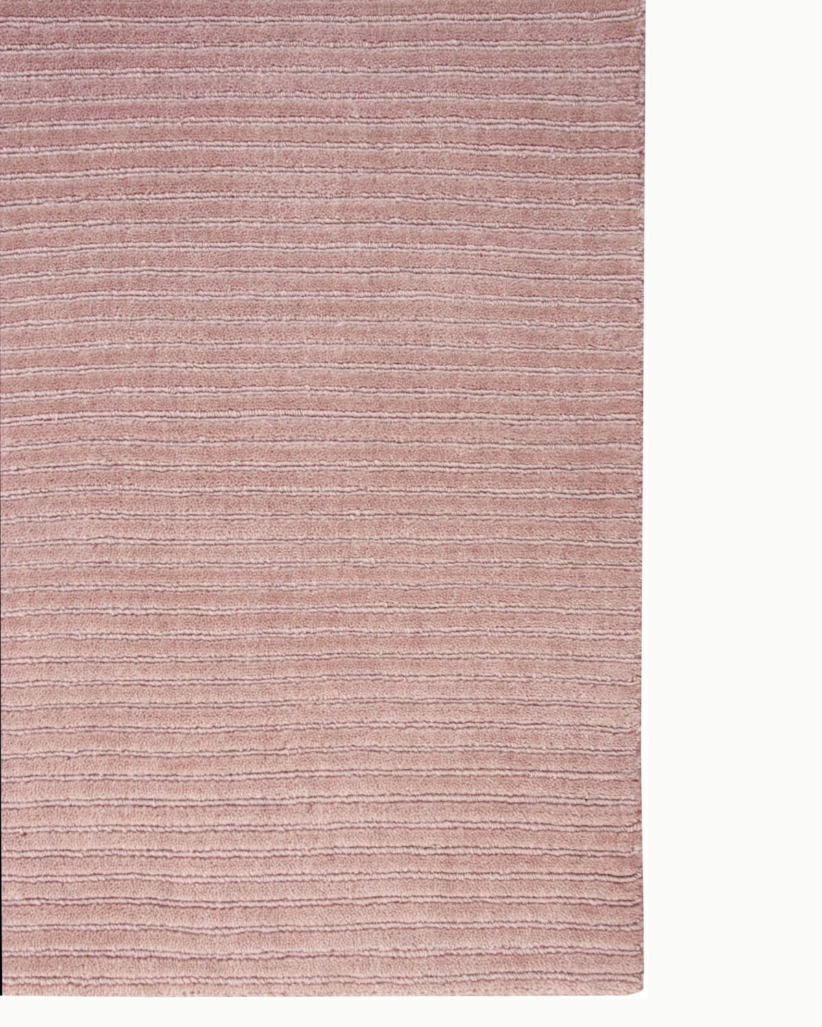 Lay-flat corner edge shot displaying straight handloomed ridges. Soft texture brings linear calm to bedroom styling.