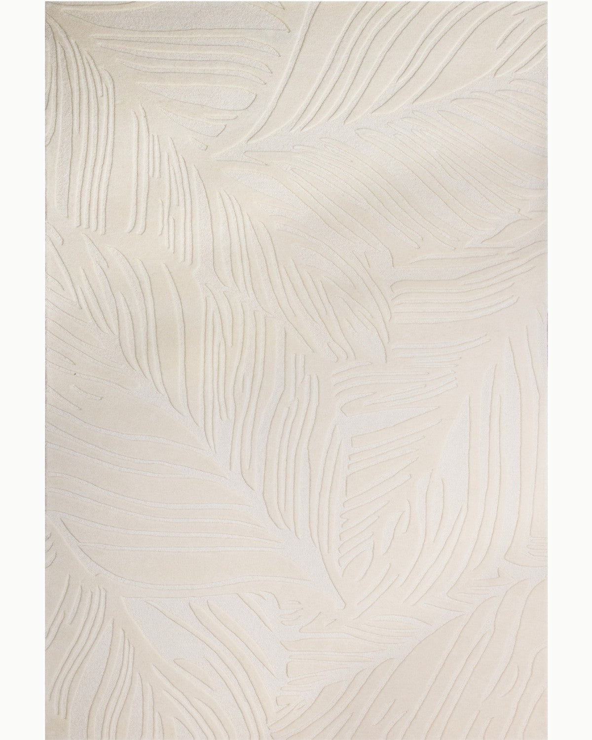 House of Bohi Sway area rug in ivory. Premium New Zealand wool featuring hand-carved lines and a fluid leaf design.