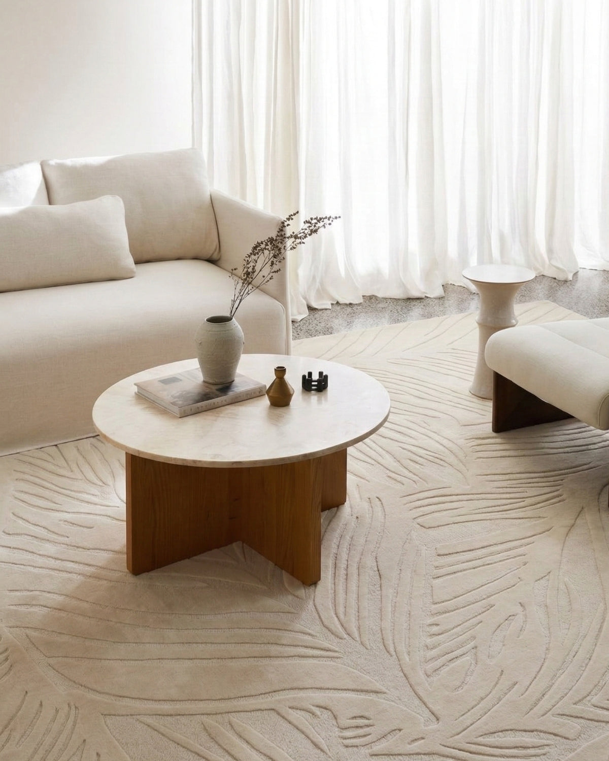 A refined statement floor covering for the living room. Handtufted design brings a rhythmic, organic presence to the space.