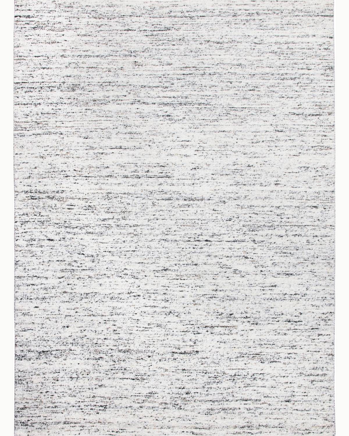 Full overhead view of Taalo Ashstone, a handwoven undyed wool rug in natural ash grey, charcoal and earthy brown tones, featuring a richly textured flatweave.