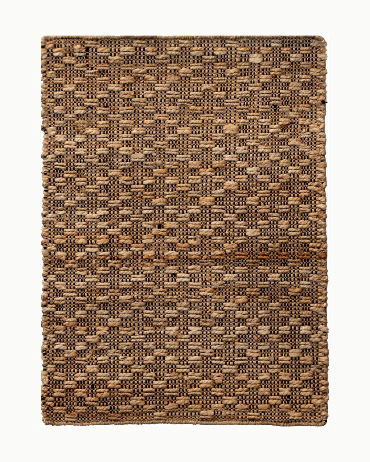 House of Bohi Arota natural jute mat featuring a handwoven flatweave with contrasting black cotton warp.