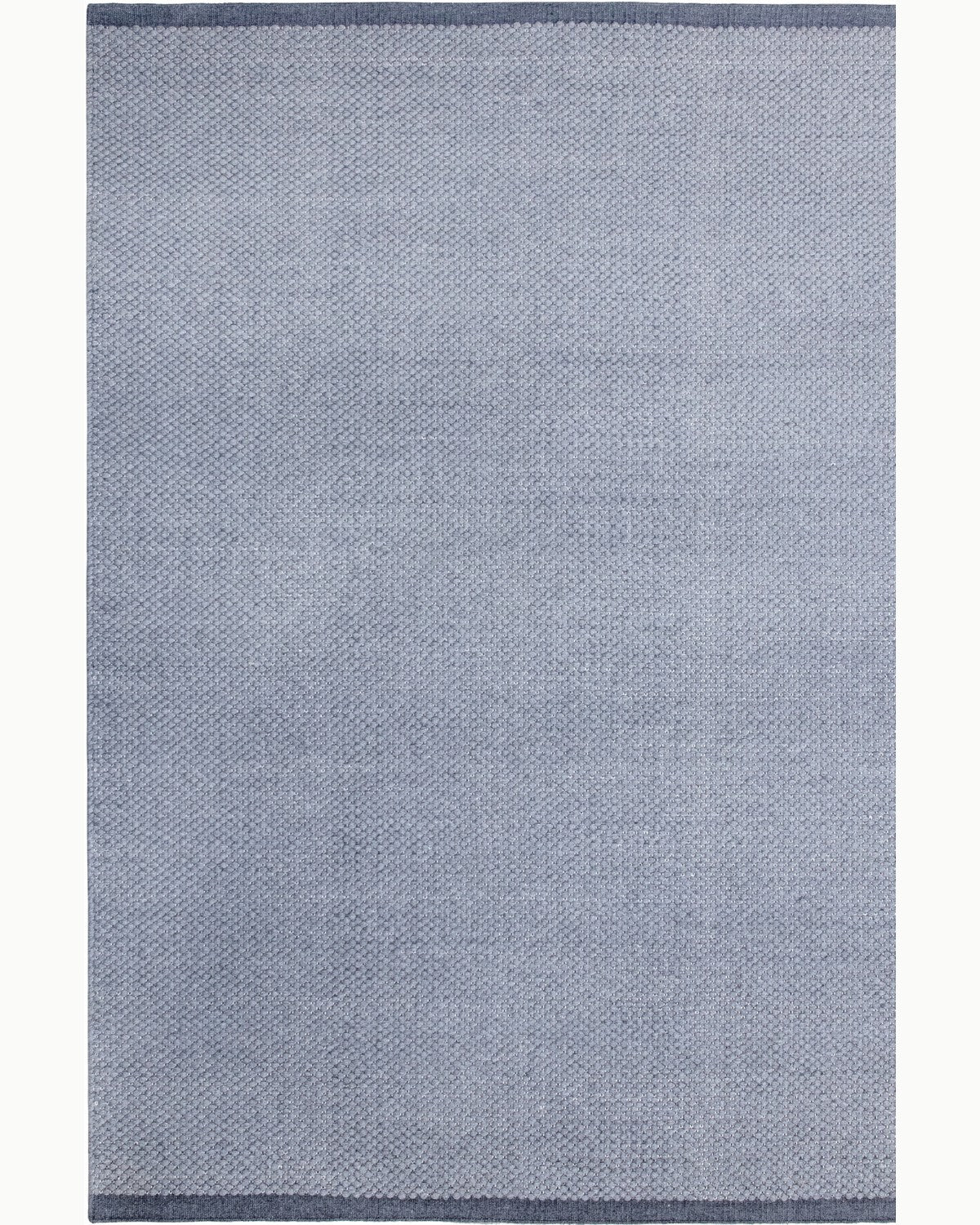 House of Bohi Bindi charcoal wool area rug featuring a handwoven flatweave with a fine, beaded texture.