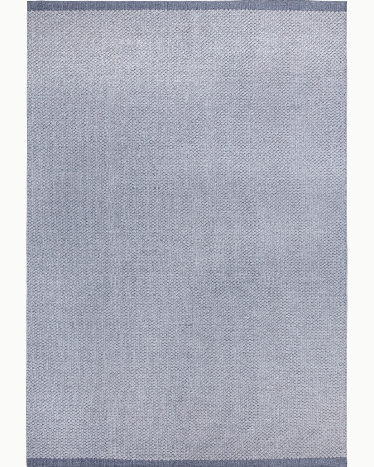 House of Bohi Bindi grey wool area rug featuring a handwoven flatweave with a fine, beaded texture.