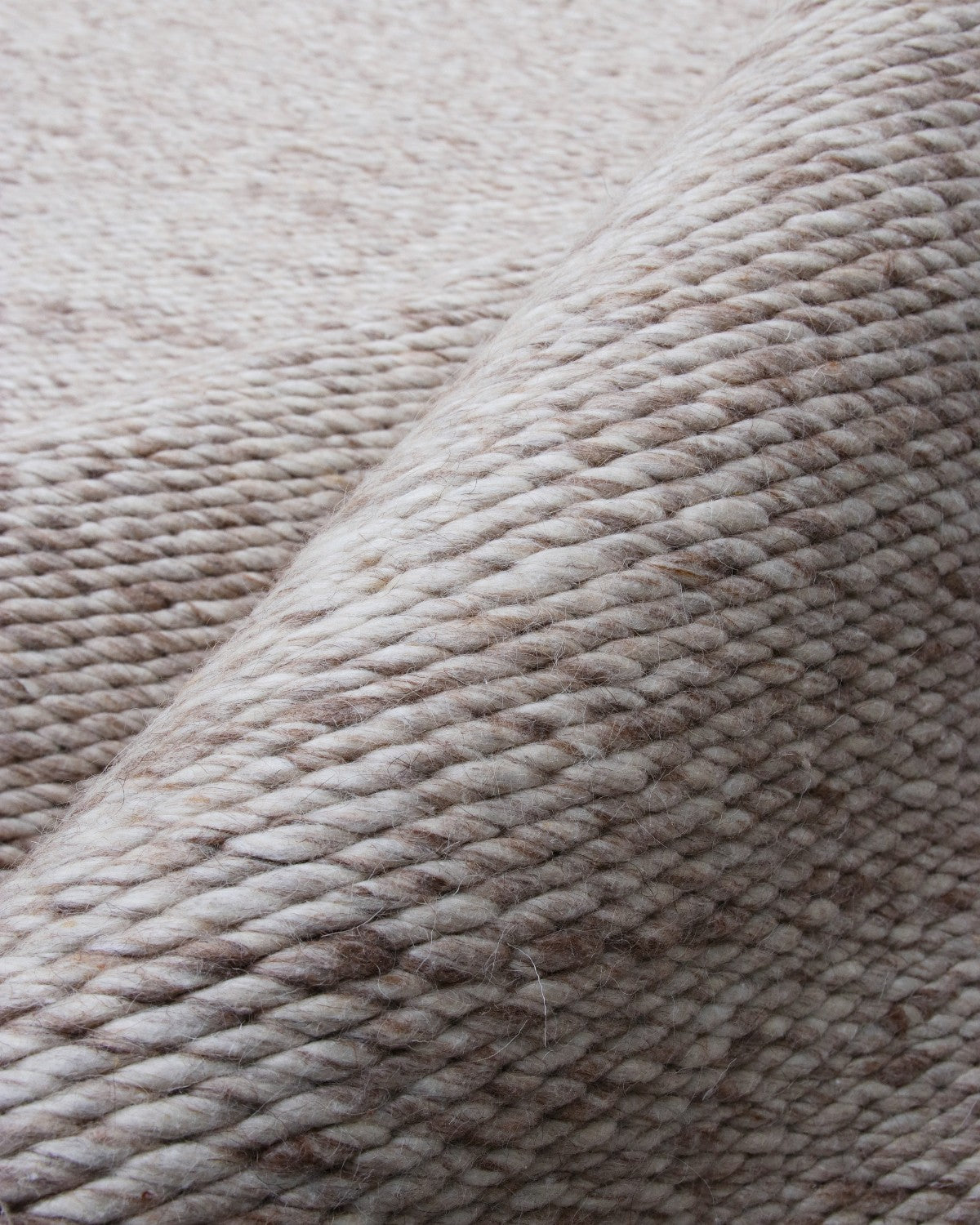 House of Bohi Buna beige wool area rug showcasing a thick, handwoven flatweave constructed from premium undyed yarn.