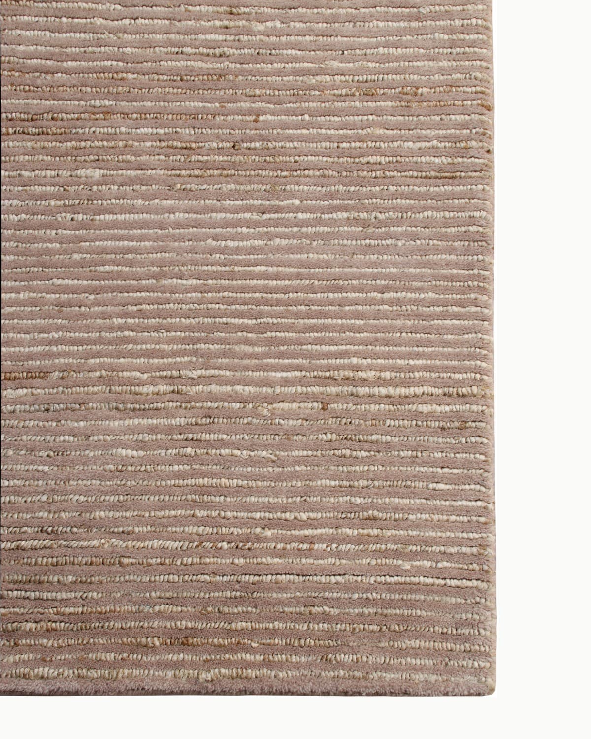 Detail of the straight edge finishing on this GoodWeave certified piece, ethically handmade in Bhadohi, India.
