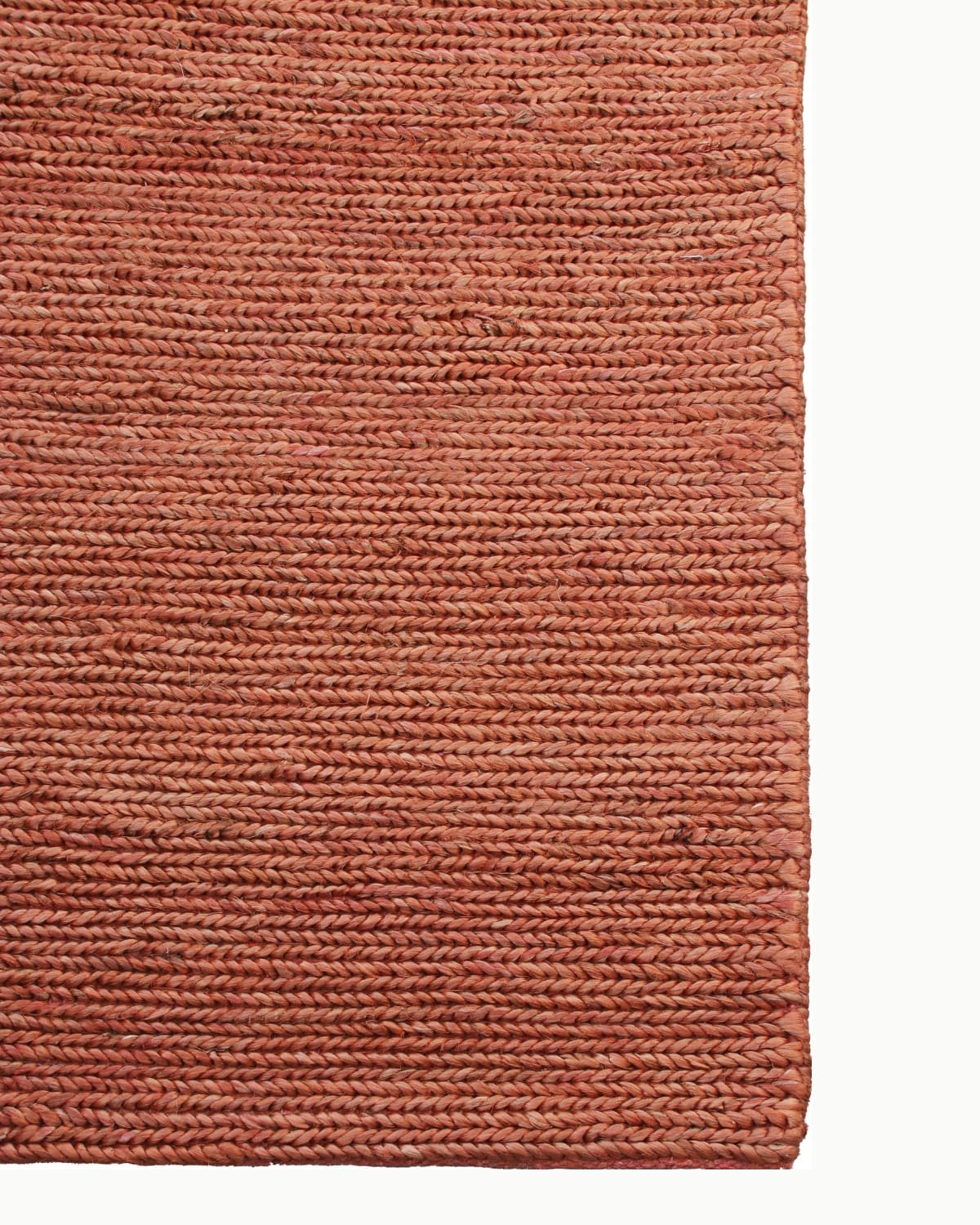 A flat corner shot detailing the straight bound edge and the structural rhythm of the natural materials.