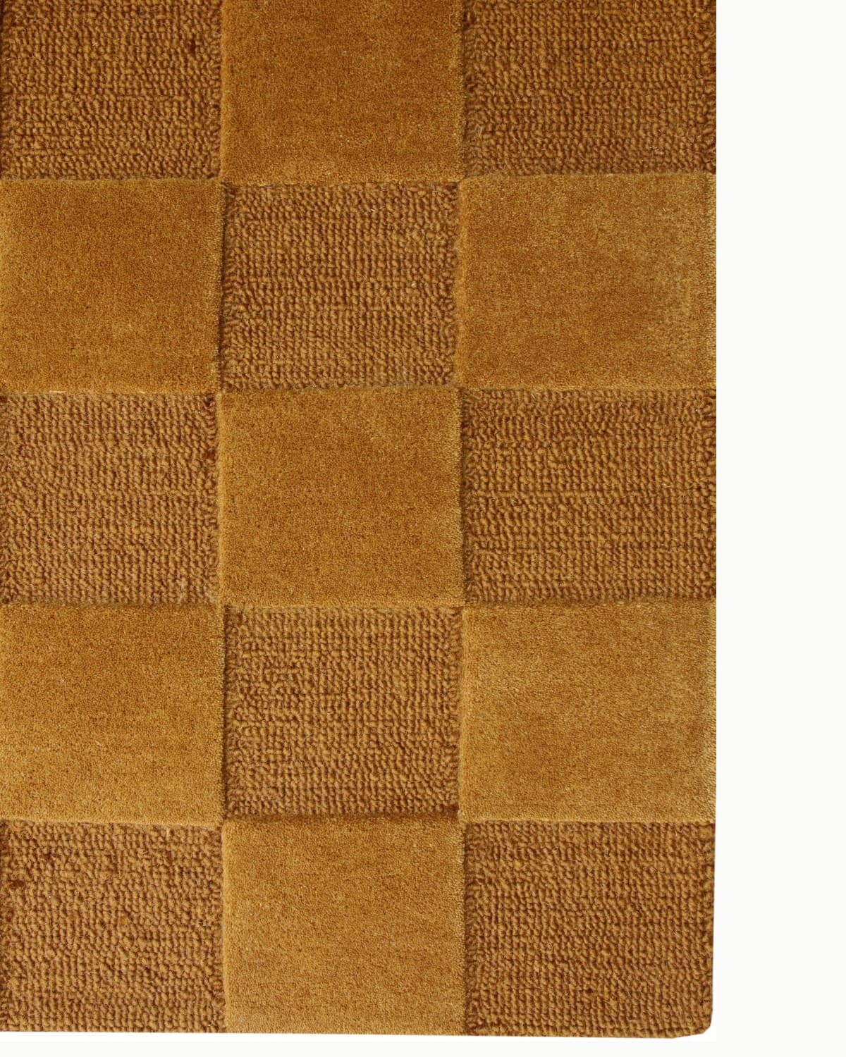 This tactile checkerboard design is a perfect geometric foundation for bringing organic warmth to a serene bedroom.