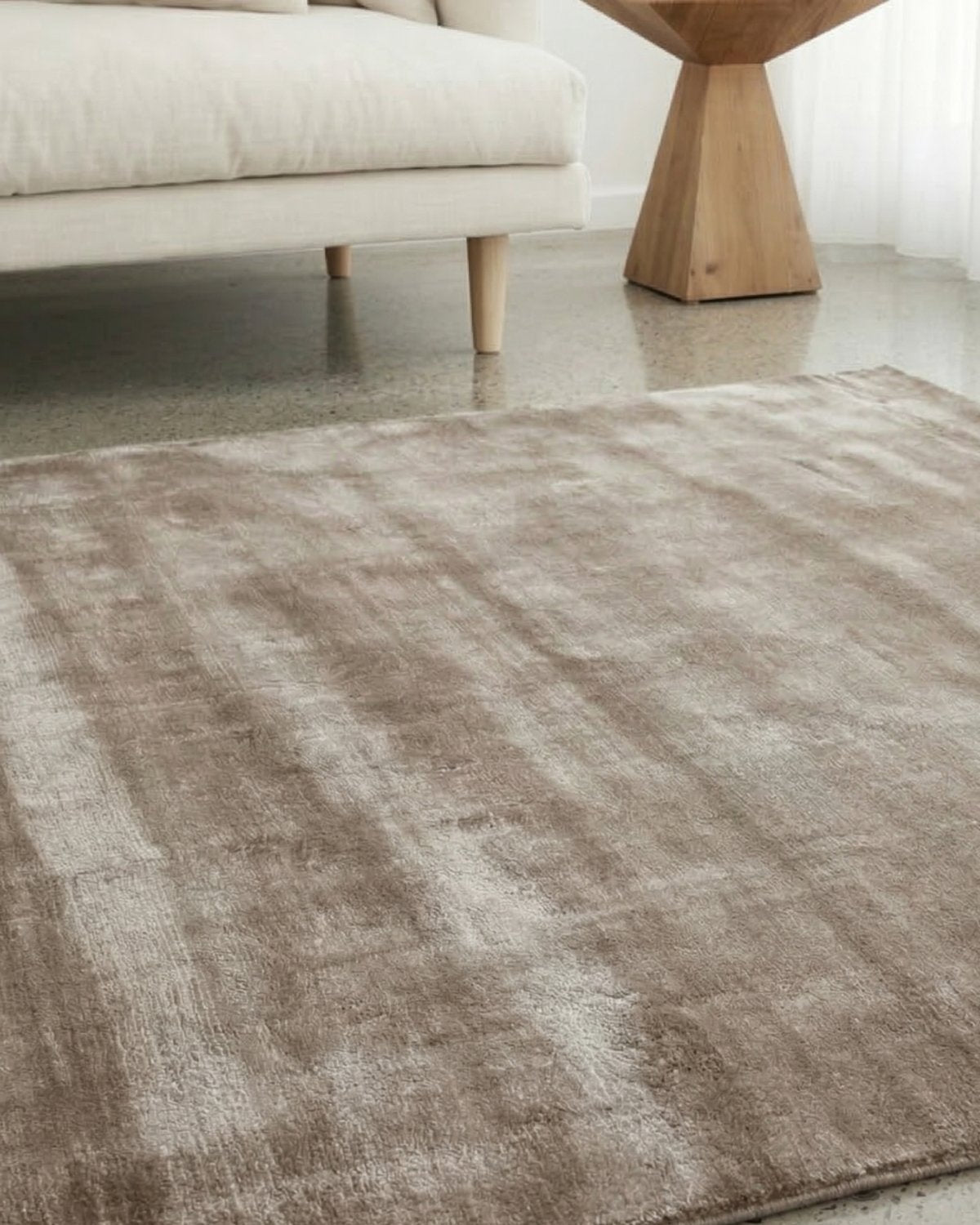 Ethereal natural fibres creating a shifting landscape of sheen and shadow, ideal for a peaceful study environment.