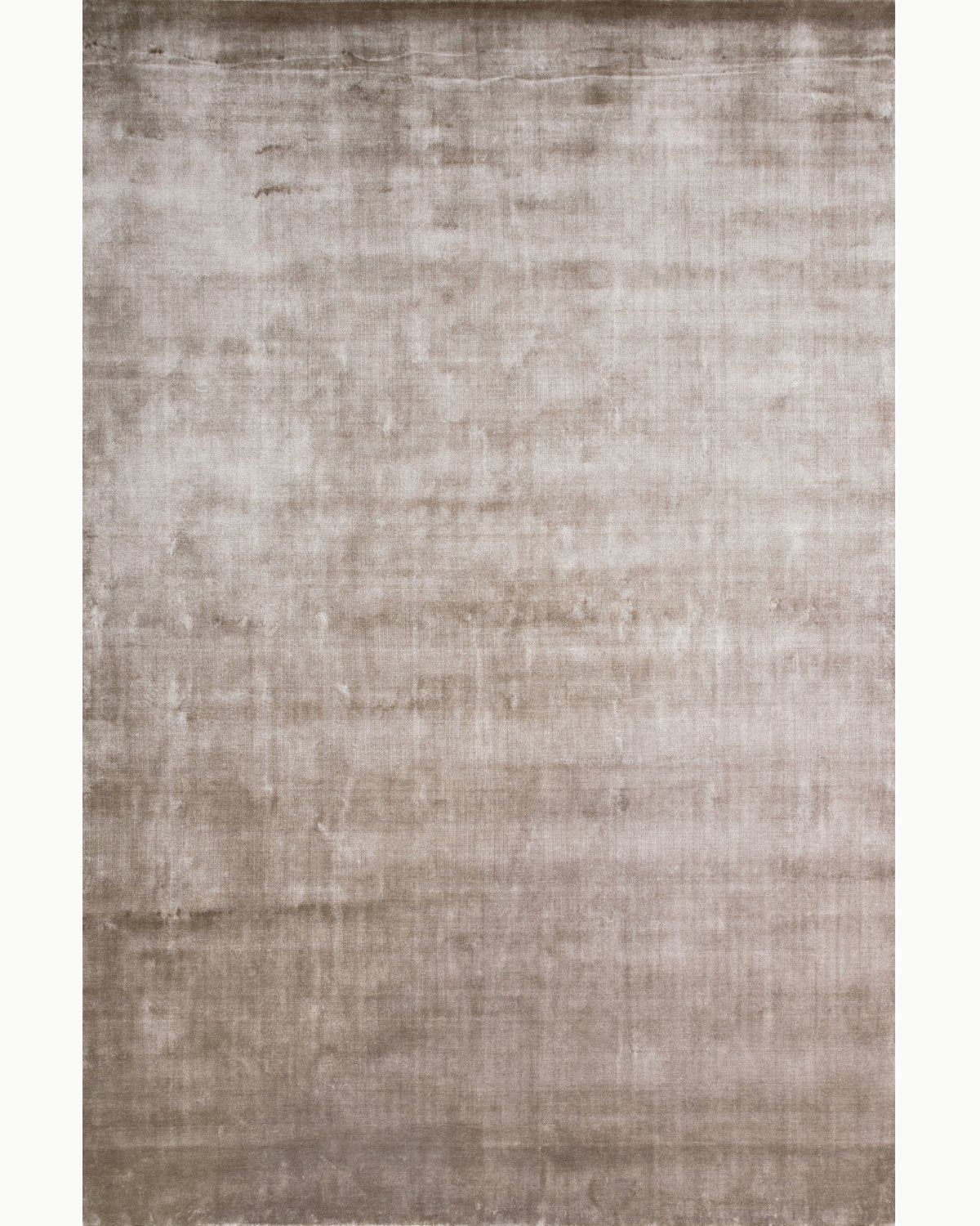 House of Bohi Noor mushroom area rug handloomed in silky Tencel, showcasing a luminous sheen and understated opulence.