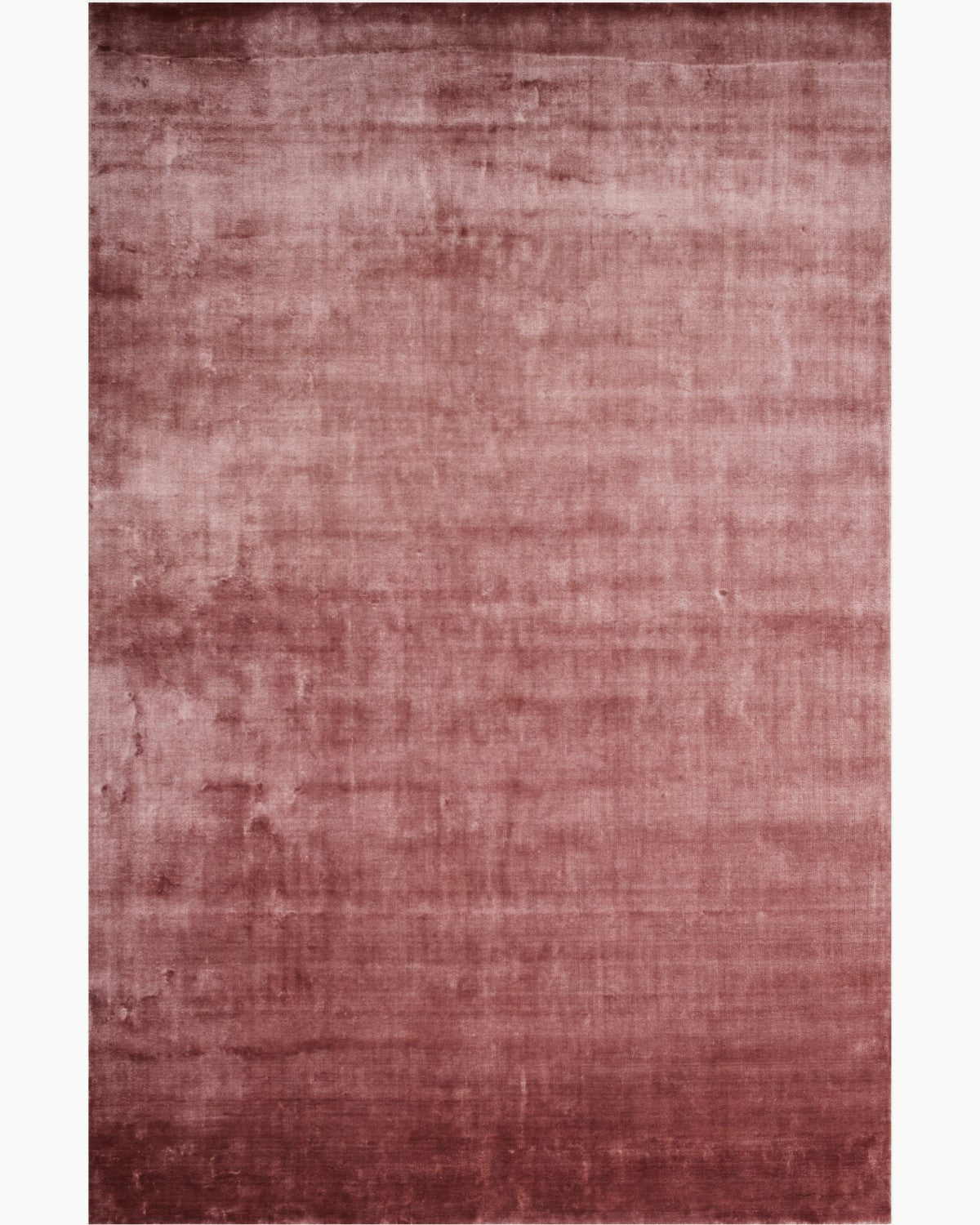 House of Bohi Noor rosewood area rug handloomed in silky Tencel, offering a luminous calm and understated opulence.