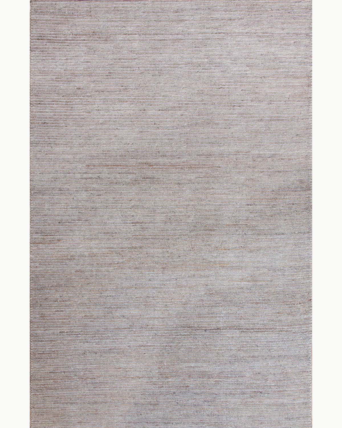 House of Bohi Rumi area rug in natural and stone. A handwoven flatweave crafted from a blend of New Zealand wool and jute.