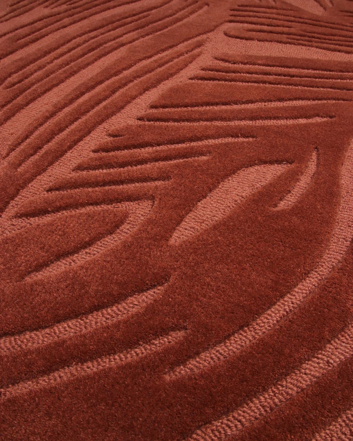 Close up macro detail of the hand-carved contours. The subtle texture invites a moment of stillness.
