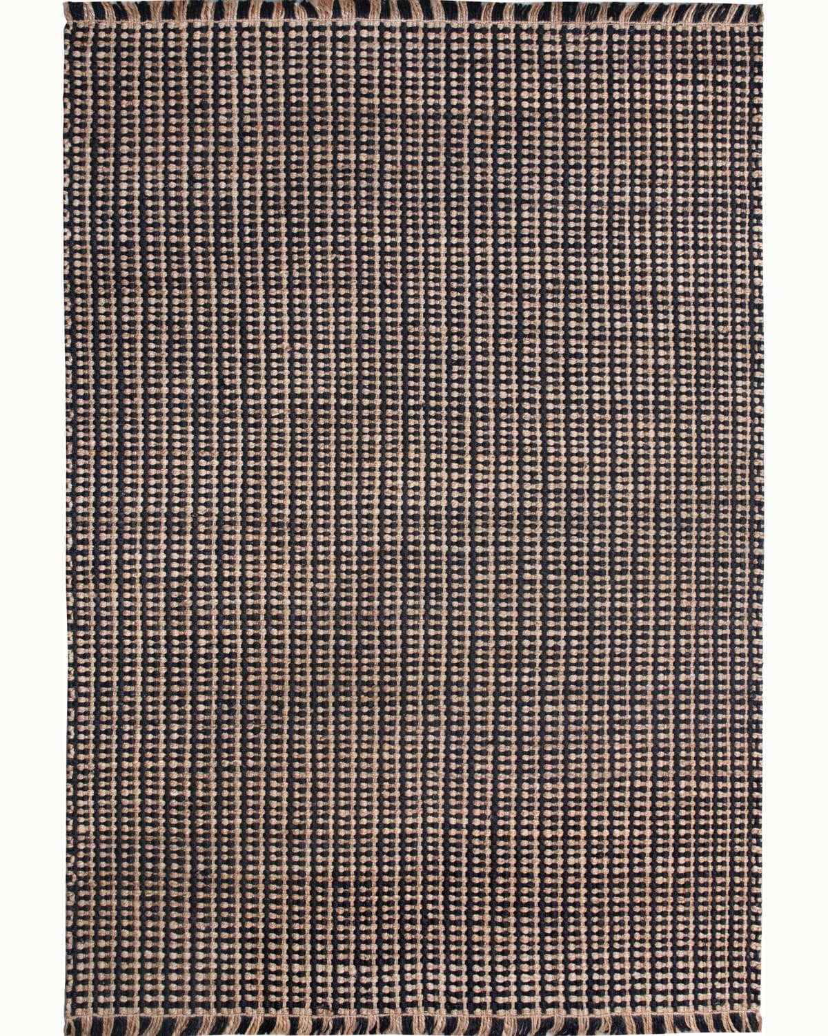 House of Bohi Tori area rug in natural and black. Handwoven from sustainable jute for a robust, organic presence.
