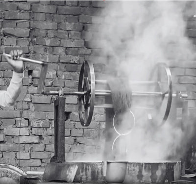 Hand-spun yarn is dyed by hand in small batches over an open fire at the House of Bohi workshop in Bhadohi, India.